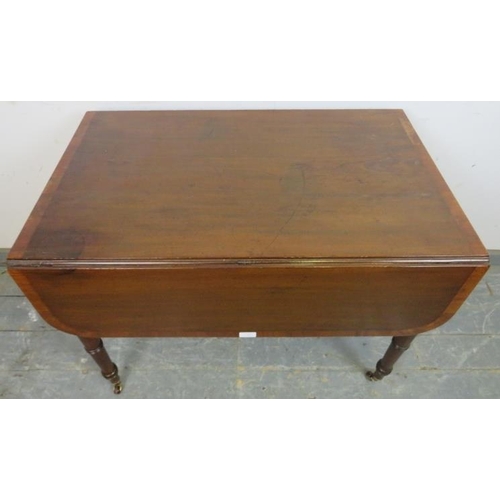 727 - A late Georgian mahogany Pembroke table, crossbanded and strung with ebony, having single drawer opp... 