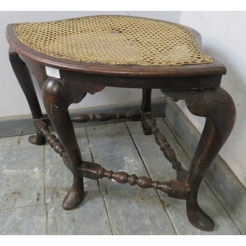 728 - An unusual 18th century mahogany corner stool with bergere seat, on cabriole supports with turned an... 