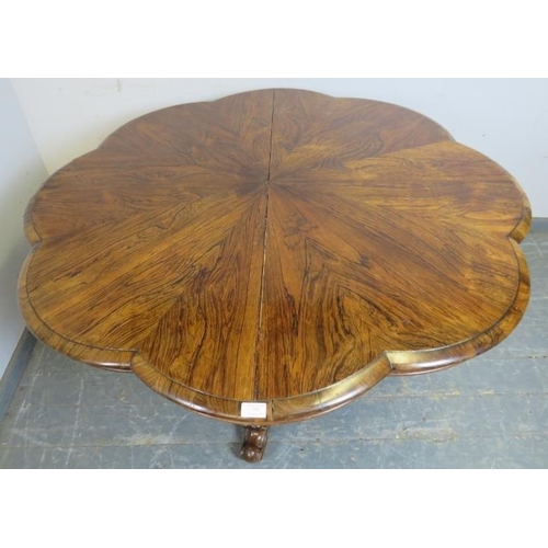 731 - A Victorian rosewood tilt-top breakfast table, the top with lobed edge, on a bulbous octagonal pedes... 