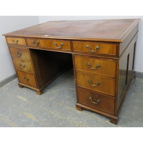 732 - A fine quality Victorian mahogany partner’s desk by Howard & Sons, the top with inset brown leather ... 