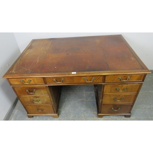 732 - A fine quality Victorian mahogany partner’s desk by Howard & Sons, the top with inset brown leather ... 