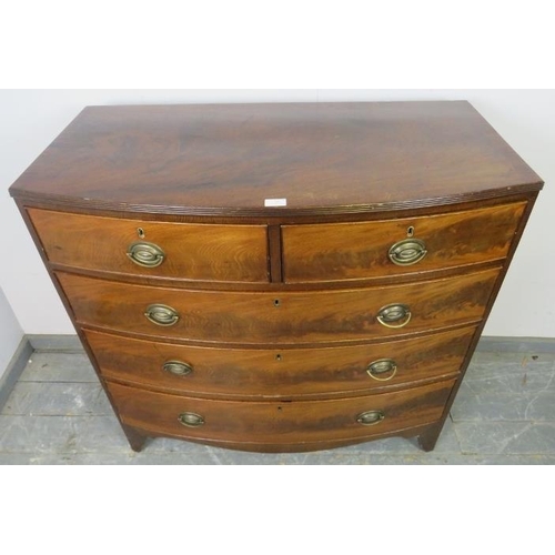 735 - A George III flame mahogany bow-fronted chest of two short over three long graduated cock-beaded dra... 