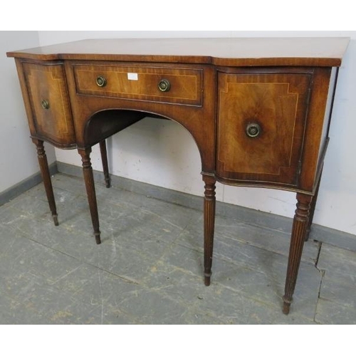 742 - A vintage mahogany reverse breakfront sideboard in the Regency taste, crossbanded and strung with sa... 