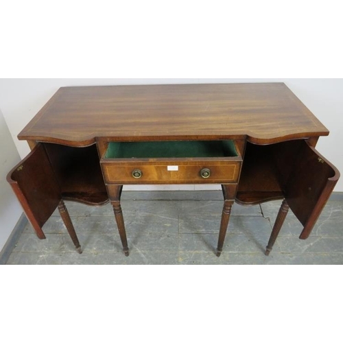 742 - A vintage mahogany reverse breakfront sideboard in the Regency taste, crossbanded and strung with sa... 