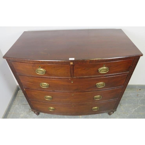 743 - A George III mahogany bow-fronted chest of two short over three long graduated cock-beaded drawers w... 