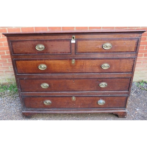 775 - A substantial George III oak mule chest, crossbanded and inlaid with mahogany and ebony, the hinged ... 