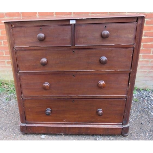 776 - A Victorian mahogany chest of two short above three long graduated drawers with turned wooden handle... 