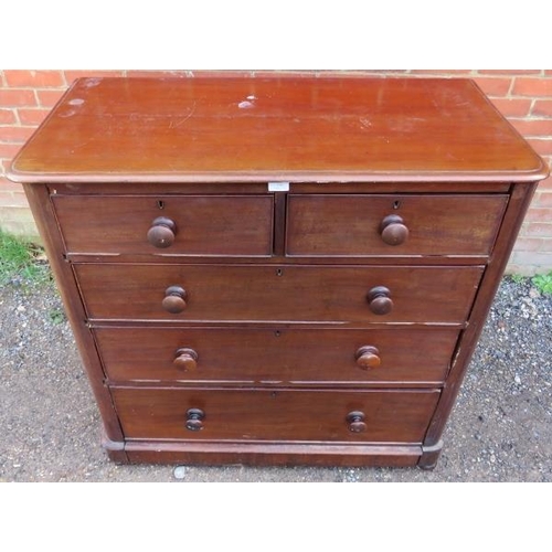 776 - A Victorian mahogany chest of two short above three long graduated drawers with turned wooden handle... 