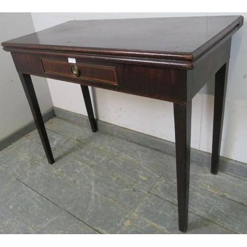 778 - A Georgian mahogany turnover tea table, having a single drawer with banded inlay, on tapering square... 