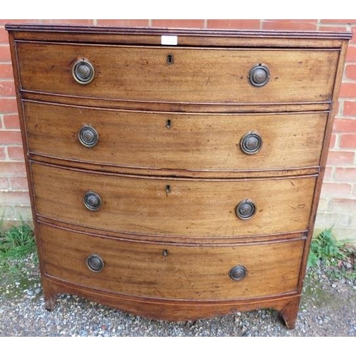 782 - A George III mahogany bow-fronted chest, having a reeded edge above four long graduated on bracket f... 