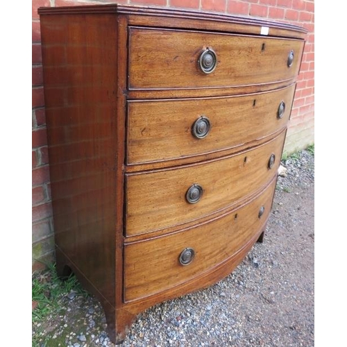 782 - A George III mahogany bow-fronted chest, having a reeded edge above four long graduated on bracket f... 