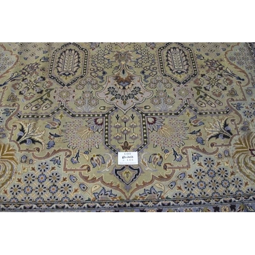 915 - Central Persian Kashmar carpet. Central motif and a repeat pattern central field on cream ground. 40... 