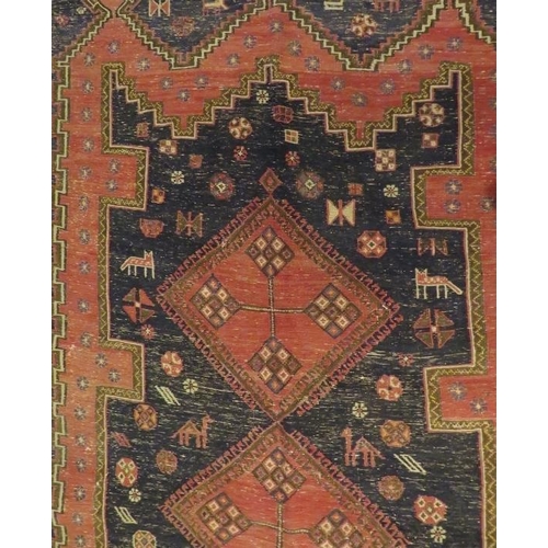 916 - North East Persian Sumak Kilim central, three interlocking diamond motif, pale red on blue ground, 2... 