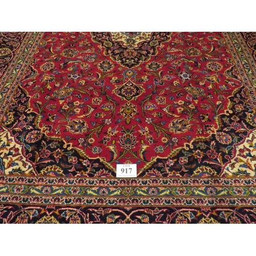 917 - Central Persian Isfahan carpet, central medallion, pale blue - cream - red, with wide borders, 353cm... 