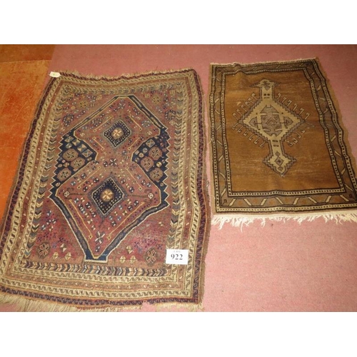 922 - Two antique Persian rugs, one 142cm x 107cm, the other 107cm x 78cm.
Condition report: Some wear and... 