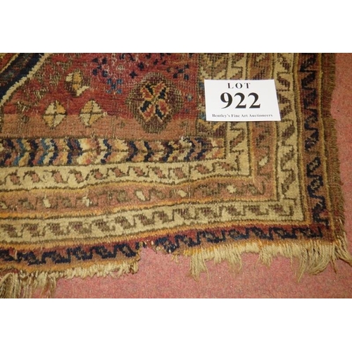 922 - Two antique Persian rugs, one 142cm x 107cm, the other 107cm x 78cm.
Condition report: Some wear and... 