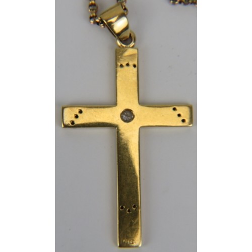 348 - A large 18ct yellow gold cross with engraved decoration & set with centre diamond and twelve smaller... 