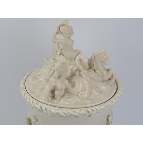 10 - A large Belleek ‘Prince of Wales’ porcelain ice pail and cover. Decorated depicting scenes of putti ... 