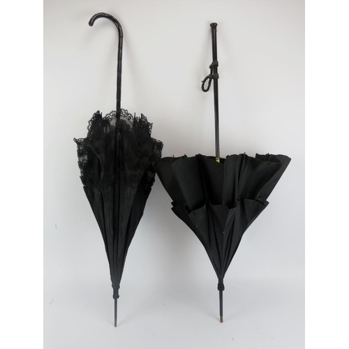 110 - Two late Victorian/Edwardian black silk and lace parasol umbrellas. (2 items) 96.8 cm length, 93.7 c... 