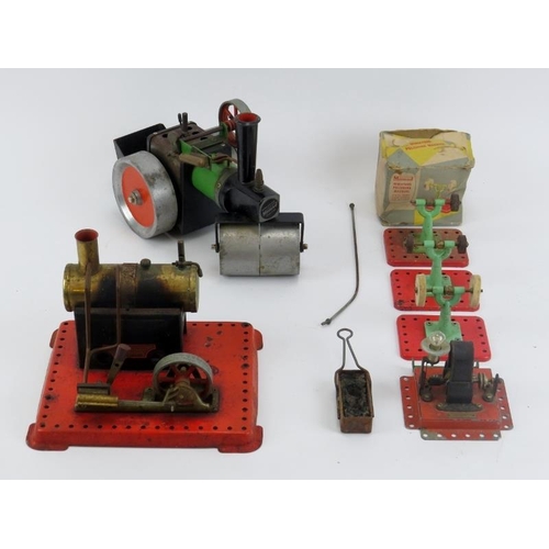 113 - A vintage Mamod steam roller, SE1 stationary steam engine with light bulb generator and polishing ma... 