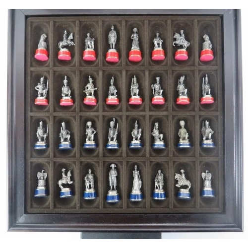 119 - A Franklin Mint Waterloo Museum ‘Battle of Waterloo Chess Set’. The cover designed as a blue and sil... 