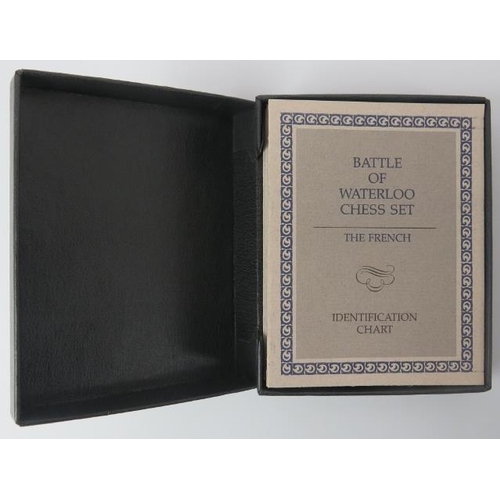 119 - A Franklin Mint Waterloo Museum ‘Battle of Waterloo Chess Set’. The cover designed as a blue and sil... 