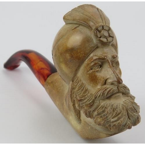 132 - Tobacconalia: A group of eight meerschaum and other clay pipes, 19th / early 20th century. Sculptura... 