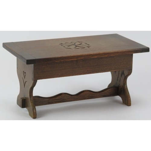 164 - A novelty oak music box formed as a refectory table, 20th century. With a Labor Swiss mechanical mov... 