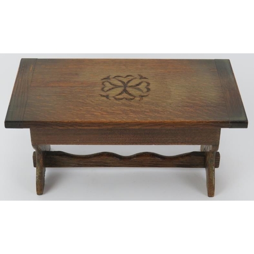 164 - A novelty oak music box formed as a refectory table, 20th century. With a Labor Swiss mechanical mov... 