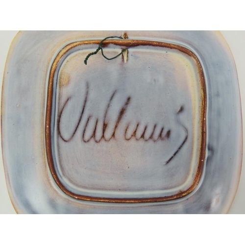 18 - A set of six Vallauris pottery plates and a matching tray, mid 20th century. Incised and glazed deco... 