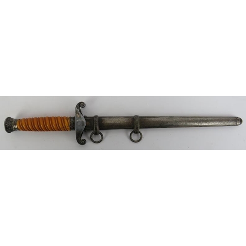 180 - Militaria: A WWII German Third Reich Army Officers dress dagger. Modelled with a steel oak leaf pomm... 