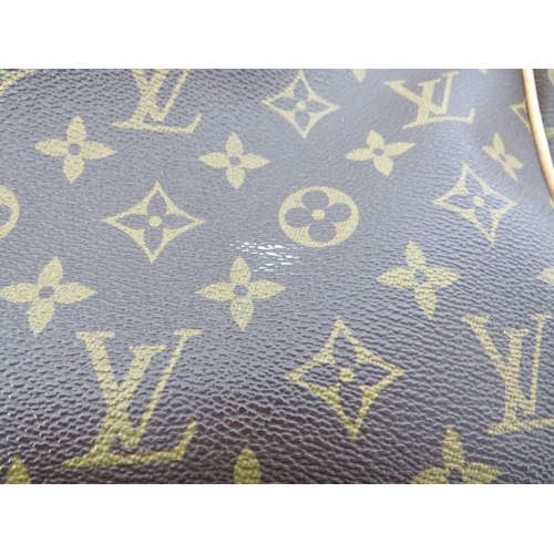 204 - A Louis Vuitton monogram canvas leather Alize 24 Heures travel bag. Brand code: VI0011. Approximate ... 