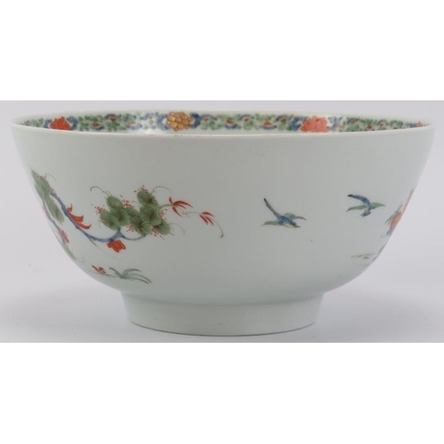 206 - A rare Worcester Kakiemon dragon bowl, mid 18th century. Finely overglaze painted with a continuous ... 