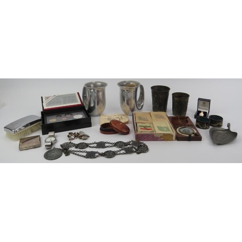 210 - A mixed lot of collectables. Notable items include a F. Barker & Son WWI military compass, a Royal C... 