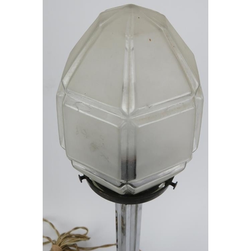 211 - An Art Deco chromed metal and glass table lamp, circa 1920s/30s. With a chrome column and faceted fr... 