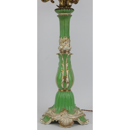 225 - A large gilt bronze and porcelain five branch candelabra, early 20th century. 85.5 cm total height i... 