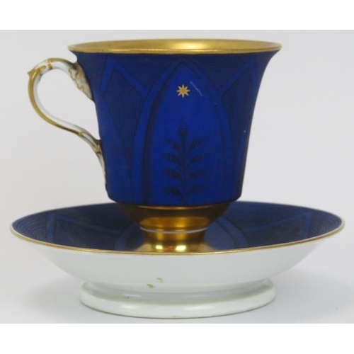 229 - A Meissen gilt and matt cobalt blue painted porcelain cabinet cup and saucer, early 19th century. De... 