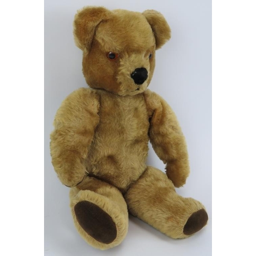 233 - A vintage golden plush teddy bear. Partially straw stuffed. 48 cm approximate height.
Condition repo... 