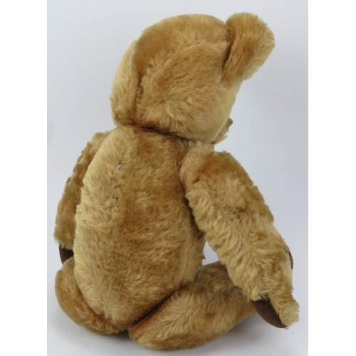 233 - A vintage golden plush teddy bear. Partially straw stuffed. 48 cm approximate height.
Condition repo... 