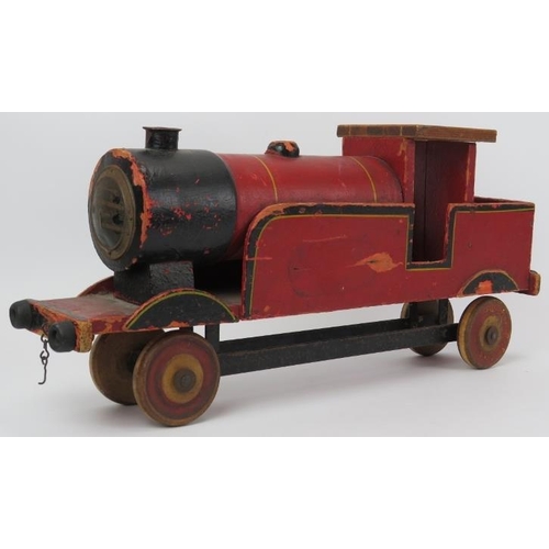 238 - Toys: A vintage Lines Bros Ltd LMS Model Train. Painted wood with tin wheels and fittings. 55.5 cm l... 