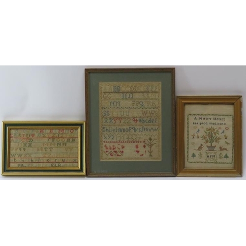 246 - An oval needlework sampler of Great Britain together with three other samplers, 19th/20th century. F... 