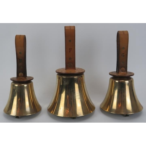 248 - A cased set of twenty two campanology bells, 20th century. The brass bells with leather handles, cap... 