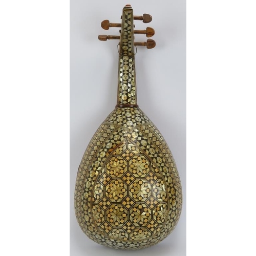 257 - Musical instruments: An Arabic oud, 20th century. Constructed using a variety of wood with the entir... 