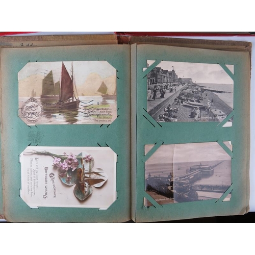 271 - Two early 20th century postcard albums and contents including many Kent based scenes, humorous, Chri... 