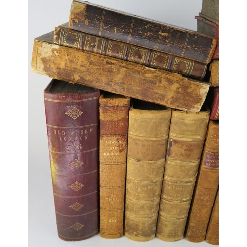 284 - Seventeen mixed 19th century leather bound books with attractive bindings, including Charles Dickens... 