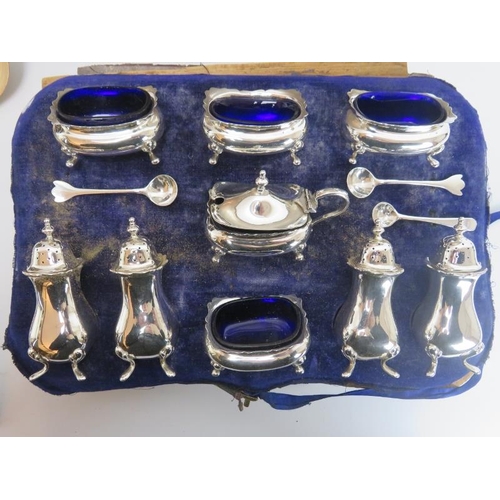 297 - A group of plated silver wares, late 19th/early 20th century. Comprising a large salver, cruet set, ... 