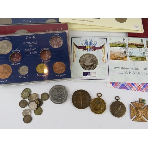 305 - A large collection of commemorative, proof and circulated coins including some silver. British Virgi... 