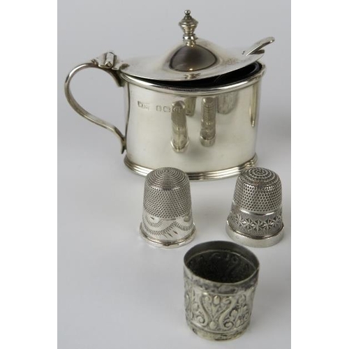 316 - Mixed hallmarked silver to include a pair of mustard pots, bangle, hip flask cup, two thimbles, butt... 