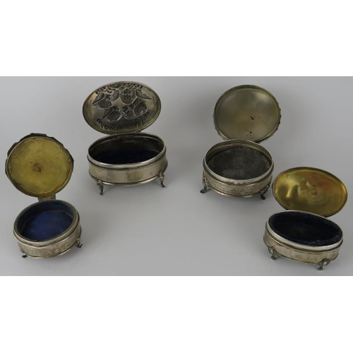 319 - Four early 20th century silver ring boxes, one with Reynold's angels decoration.  Various dates and ... 