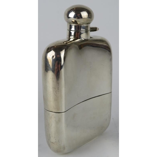 328 - A 1920s silver hip flask with removable silver cup.  Hallmarked for Birmingham 1920, maker Hubert Ha... 